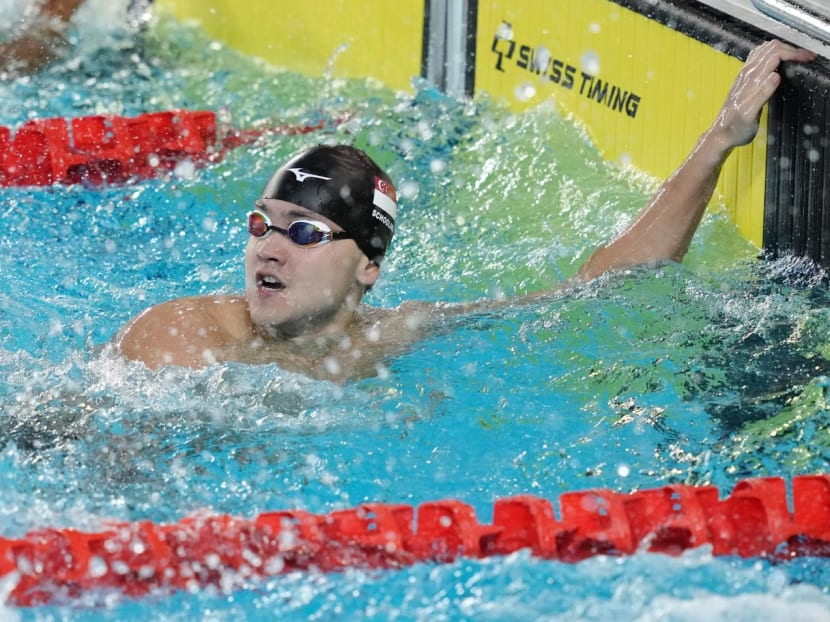 Joseph Schooling celebrates after winning the men's 100m butterfly during the 31st SEA Games in Hanoi, Vietnam, on May 16, 2022. 