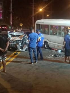 Rescue workers prepare to take the people injured in a crash between a car and a tour bus to hospitals in Karon area, Phuket, on Aug 12, 2022.
