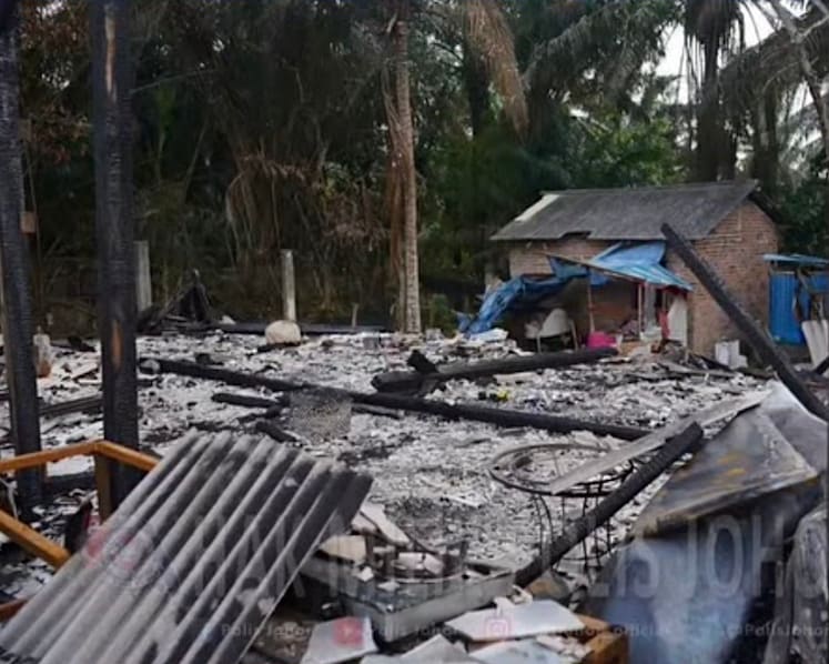  2 Malaysian brothers charged with murder after 6 bodies found in burnt Johor house