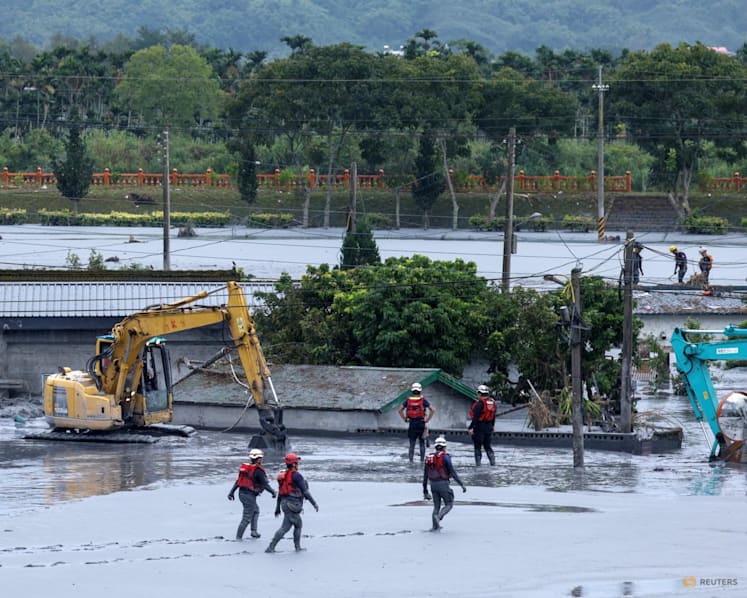 Taiwan rescuers battle thick mud to look for missing from Super Typhoon Ragasa