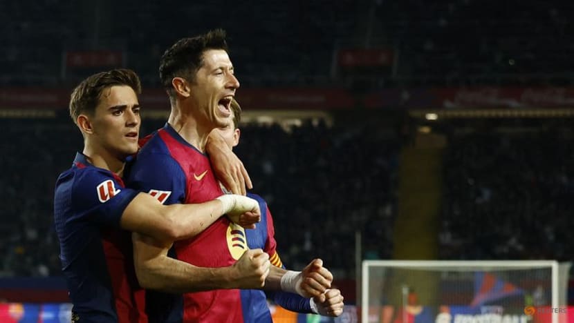 Barcelona edge Rayo to claim top spot with Lewandowski penalty Barcelona edge Rayo to claim top spot with Lewandowski penalty