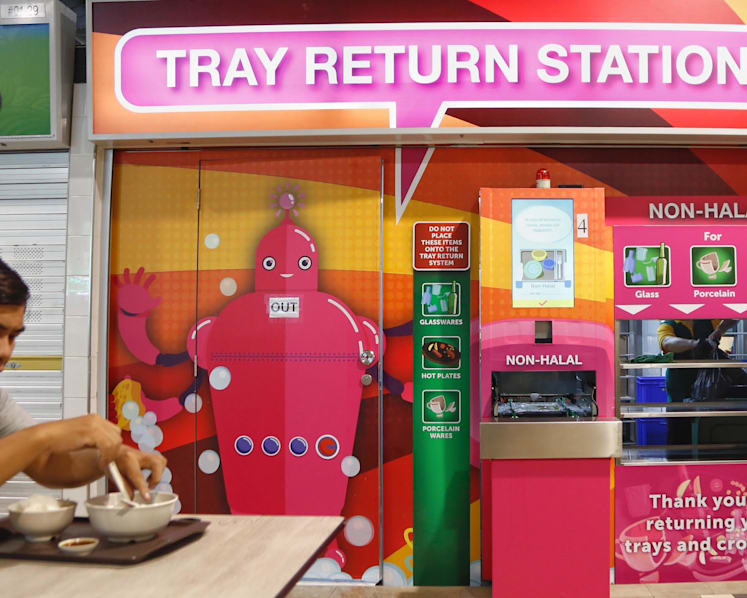 More returning trays at hawker centres, but behavioural change will take time: NEA