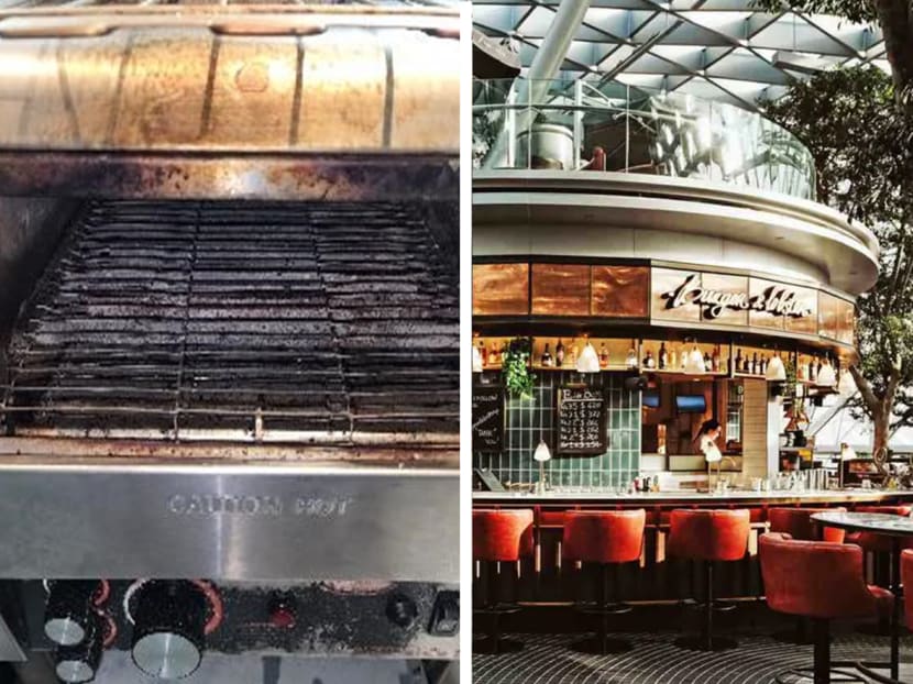 Burger & Lobster, a restaurant at Jewel Changi Airport (right), was found to have food safety and hygiene lapses, including a badly burnt and stained toaster oven (left). Burger & Lobster, a restaurant at Jewel Changi Airport (right), was found to have food safety and hygiene lapses, including a badly burnt and stained toaster oven (left).