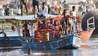 At least 10 dead after boat hits bridge in India: police