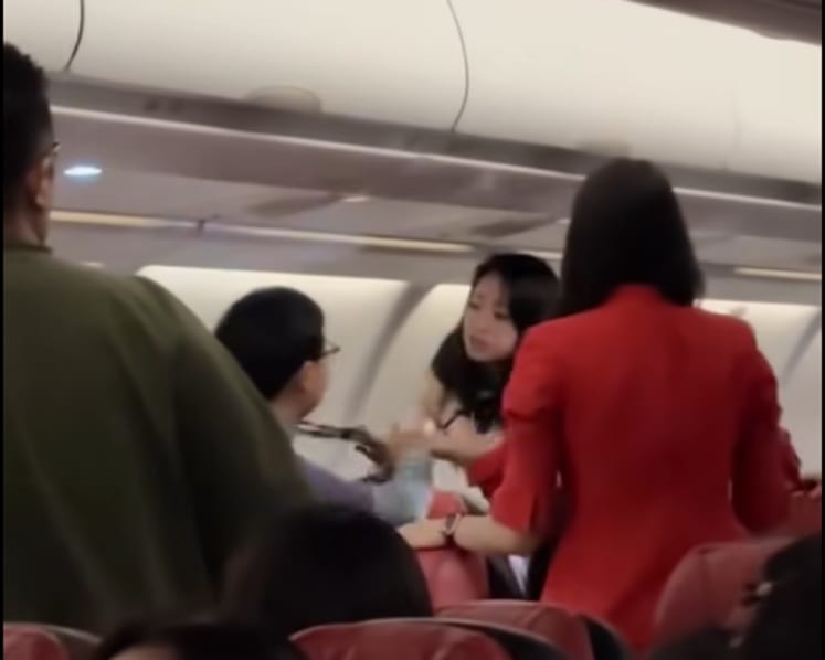 'I want to sleep': Fight erupts on AirAsia X flight after passengers keep talking despite dimmed cabin lights