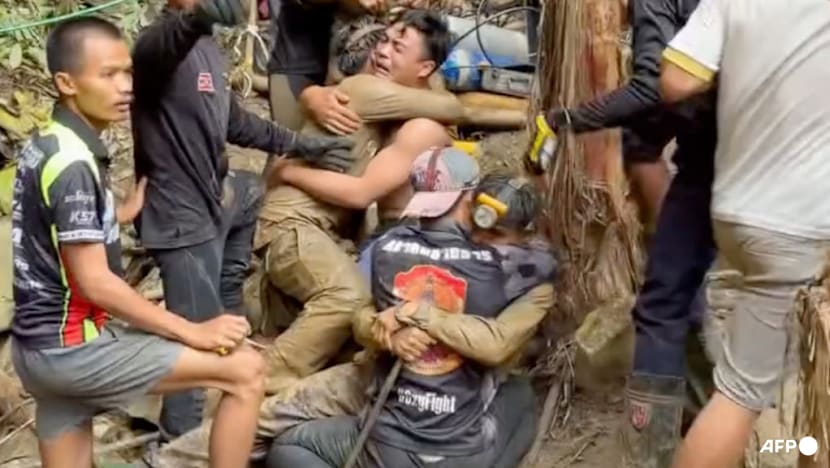 Survivors advise rescuers in search for last two stuck in Laos cave