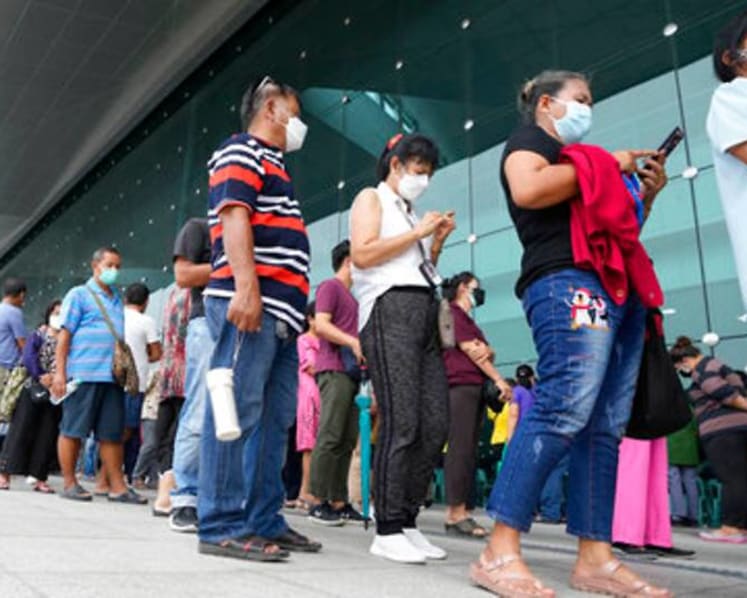 Bangkok closes public spaces as COVID-19 surges in Thailand