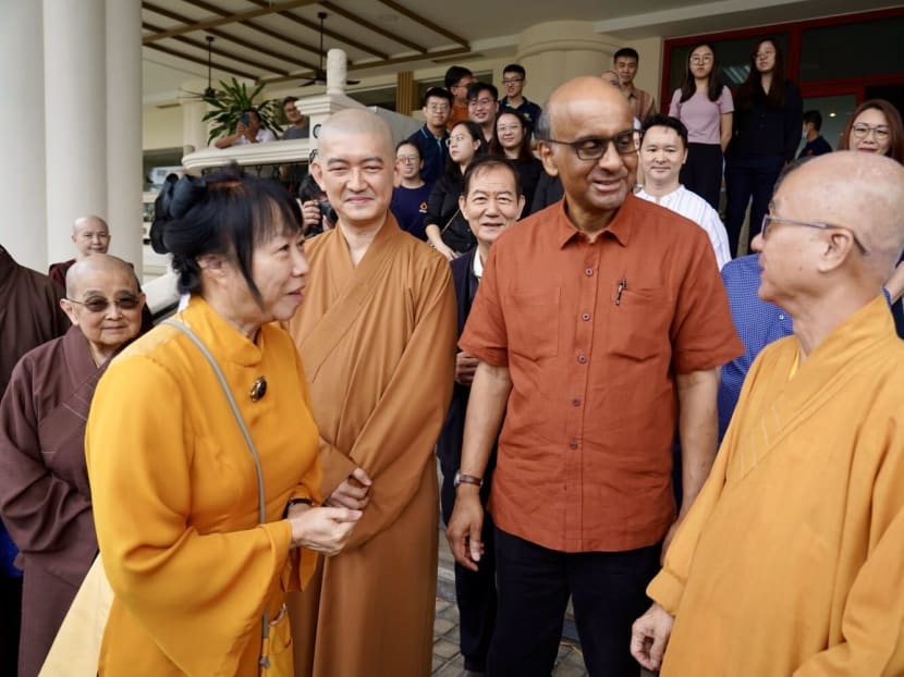 Mr Tharman Shanmugaratnam (second from right) and wife Jane Yumiko Ittogi (left) interacting with monks from the Kong Meng San Phor Kark See Monastery after a dialogue with the temple’s youths. Mr Tharman Shanmugaratnam (second from right) and wife Jane Yumiko Ittogi (left) interacting with monks from the Kong Meng San Phor Kark See Monastery after a dialogue with the temple’s youths.