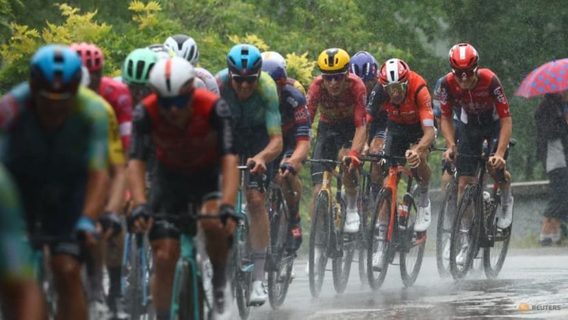 Tour de France final stage neutralised after slippery road conditions