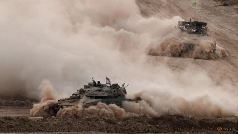 Israeli tanks kill 59 people in Gaza crowd trying to get food aid, medics say Israeli tanks kill 59 people in Gaza crowd trying to get food aid, medics say