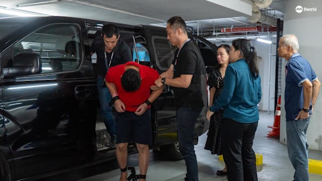 牛车水酒店杀妻案 被告被押回现场回避媒体镜头