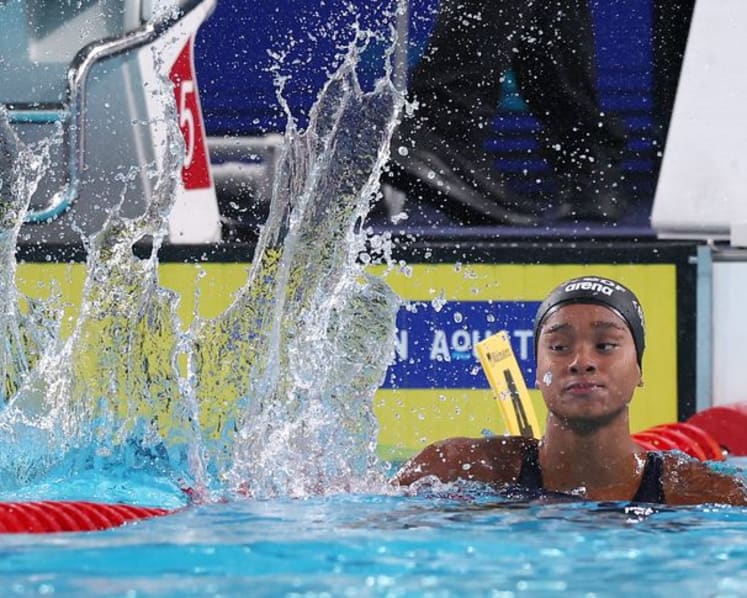 Italy's Curtis betters own 50m backstroke world record