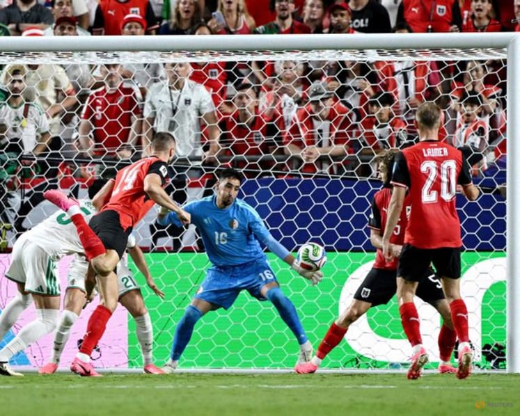 Austria, Algeria defy controversial format to deliver World Cup thriller