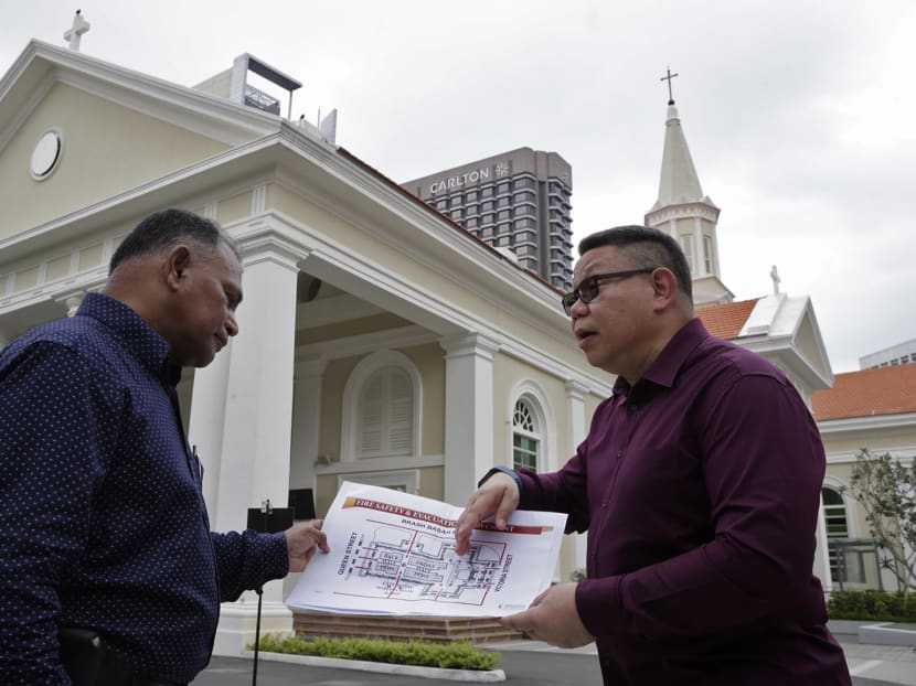 Andre Ahchak (R) Director, Archdiocesan Communications Office and Abdul Wahab (L), Vice-Chair, Al-Khair Mosque discussing plans related to SGSecure at Cathedral of the Good Shepherd. Photo: Wee Teck Hian/TODAY Andre Ahchak (R) Director, Archdiocesan Communications Office and Abdul Wahab (L), Vice-Chair, Al-Khair Mosque discussing plans related to SGSecure at Cathedral of the Good Shepherd. Photo: Wee Teck Hian/TODAY