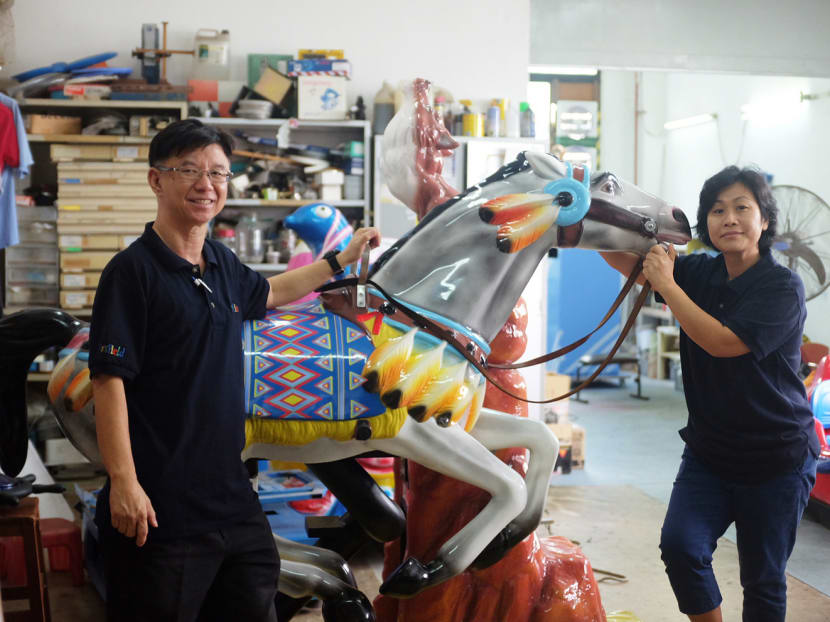 Director of Patsfield Services, Mr Robert Chew and his wife Mary Chew, who helps him with the kiddie ride business. Photo: Toh Ee Ming/TODAY