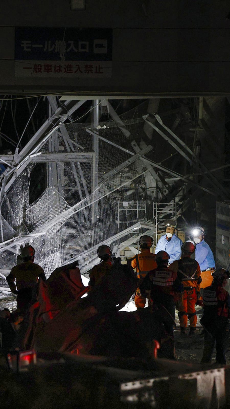 Rescuers in Japan haul survivors from collapsed mall as earthquake toll rises to 13