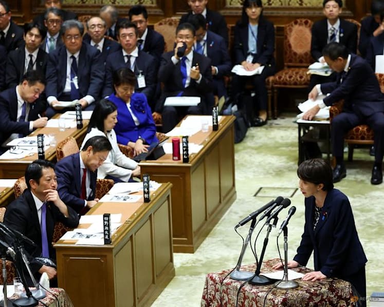 Japan PM says won't rule out debt issuance to fund tax cut