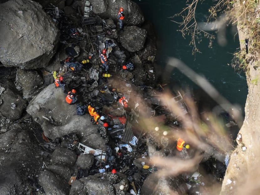 Rescue teams search for victims at the site of the Yeti Airlines plane crash, in Pokhara on Jan 17, 2023.