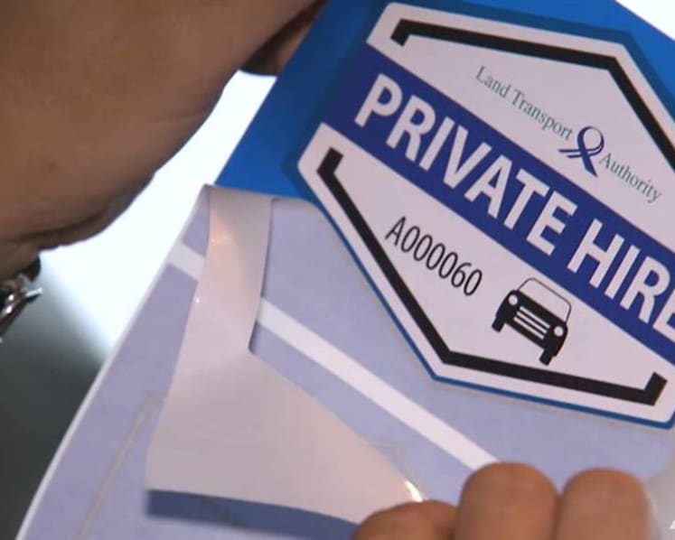 Private-hire driver fined for driving over woman's foot while leaning forward to check phone