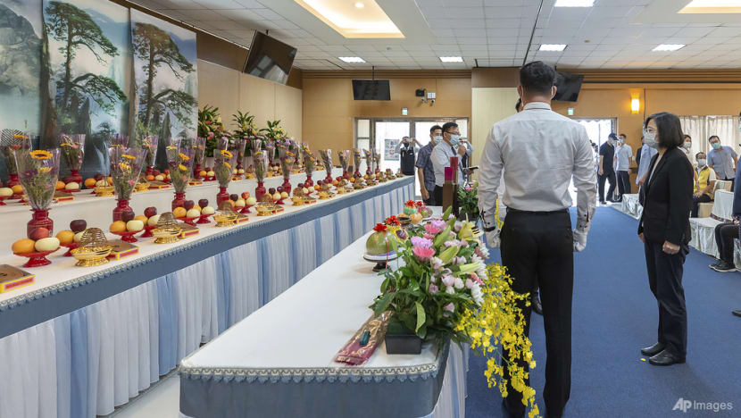 Taiwan's leader pays respects to 46 dead in building inferno