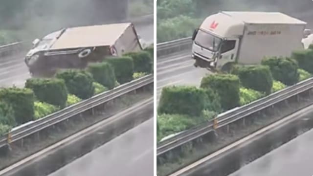 撞护栏后腾空翻滚 货车竟神奇四轮落地