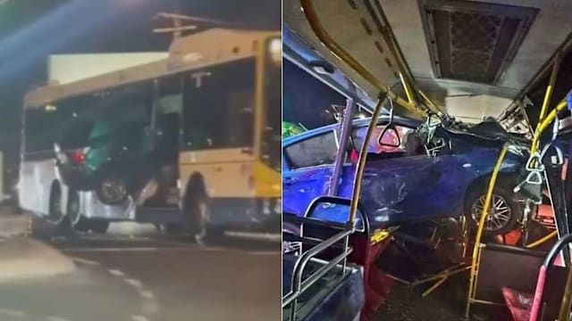 疑闪避休旅车失控 轿车腾空撞入巴士