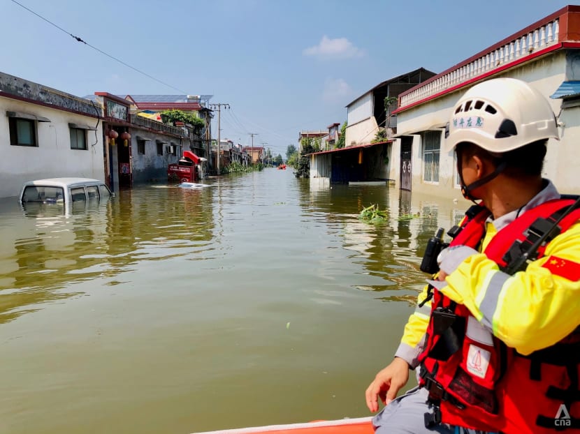 'If it's your time to go, it's time to go': Henan survivors pick up the pieces after deadly floods