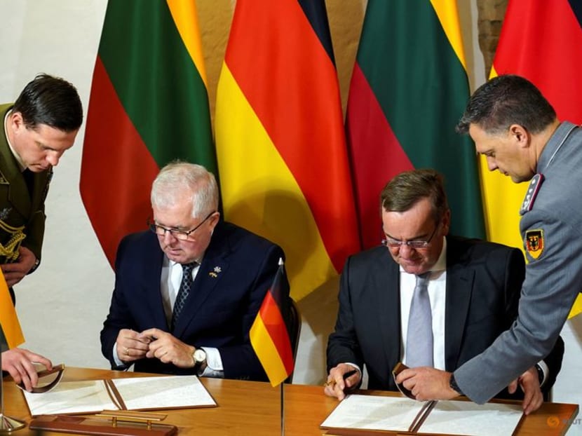 German Defence Minister Boris Pistorius and Lithuanian Defence Minister Arvydas Anusauskas sign an agreement for further deployment of thousands of German troops to the Baltic country in Vilnius, Lithuania December 18, 2023. REUTERS/Janis Laizans