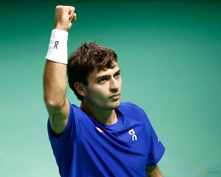 Battling Cobolli sends holders Italy into Davis Cup final