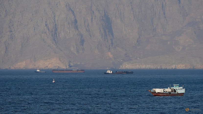 Iran hits ships and UAE oil port in show of force after Trump orders Navy to open strait