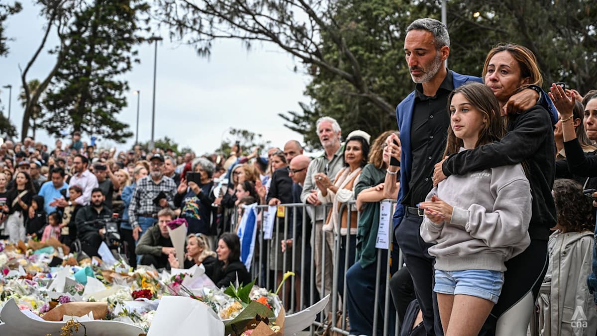 After Bondi Beach shooting, visitors and locals seek normality amid grief