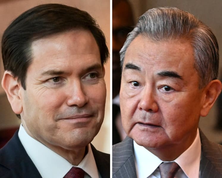 US, China trade veiled barbs at ASEAN meetings, pledge support for regional bloc 
