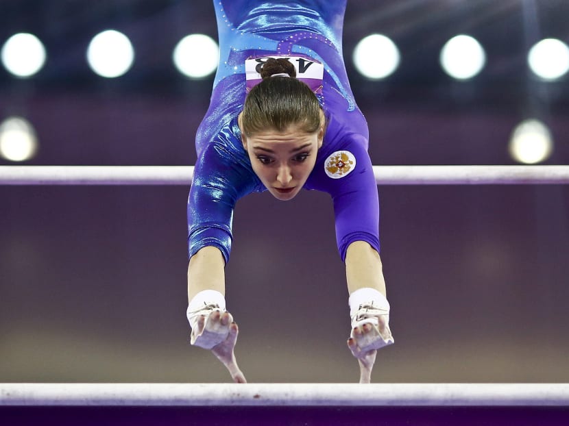 Aliya Mustafina of Russia competes on uneven bars during the women's gymnastics all around finals at the 1st European Games in Baku, Azerbaijan, June 18 , 2015. Photo: Reuters