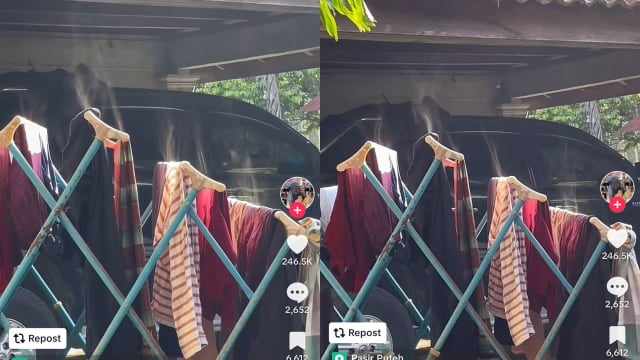 马女酷热天气晒衣冒白烟 网笑：热到衣服魂魄跑出来