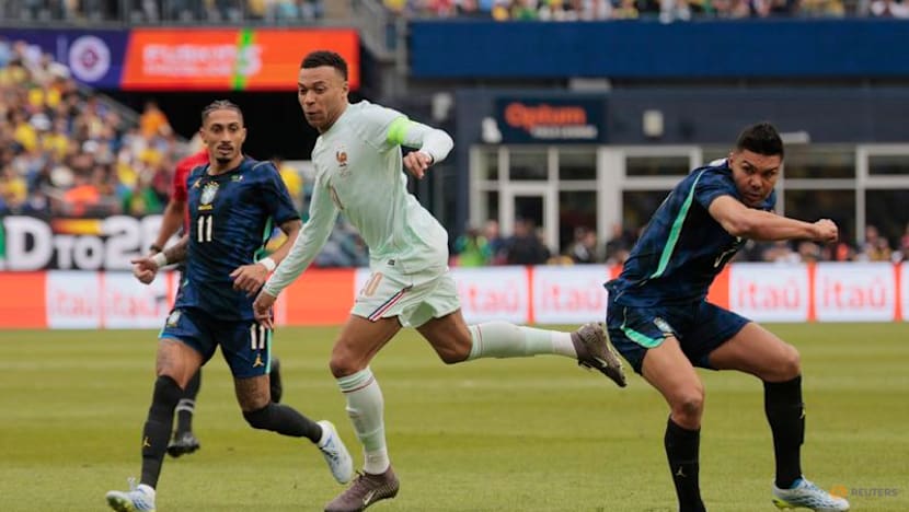 Mbappe inspires 10-man France to Brazil win