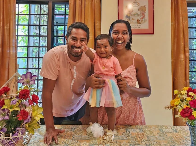 Ms Jayasutha Samuthiran, 32, with her husband, Gouthaman Haridass, 34, and their daughter Milir. The young family intends to expand their family but are mindful of rising costs.