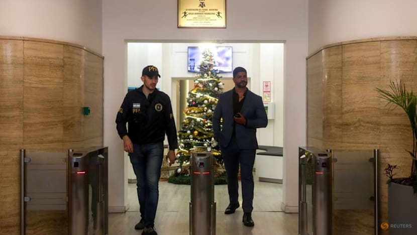 Argentine FA and soccer clubs raided in money laundering probe, La Nacion  reports - CNA