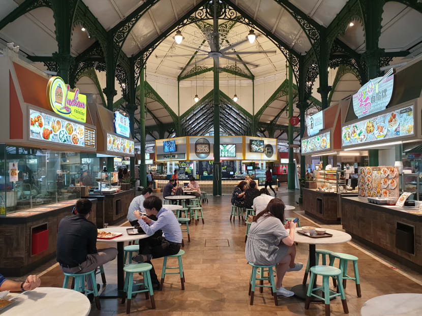A snapshot of patrons at the relatively quiet Lau Pa Sat food centre at lunchtime on July 12, 2021.
