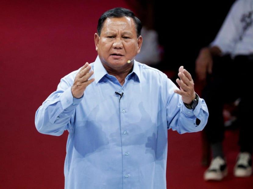 Indonesia's Defence Minister and presidential candidate, Prabowo Subianto, gestures during a televised debate at the election commission headquarters in Jakarta, Indonesia, December 12, 2023. Indonesia's Defence Minister and presidential candidate, Prabowo Subianto, gestures during a televised debate at the election commission headquarters in Jakarta, Indonesia, December 12, 2023.