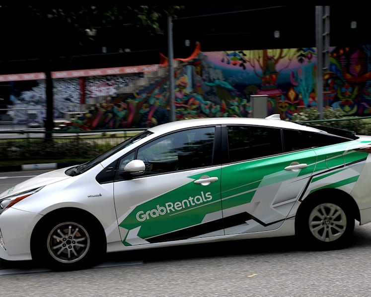 Drivers say S$1 fare hike by Grab not helpful, commission taken from earnings should be reduced instead