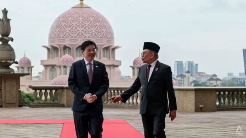  Apa yang dipersetujui PM Malaysia dan SG untuk hurai isu ruang udara, sempadan maritim?