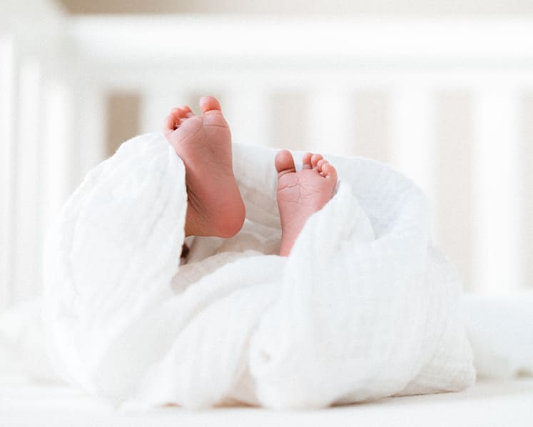 Open verdict on death of 3-week-old baby who fell asleep in arms of dozing confinement nanny