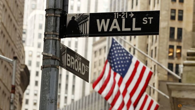 Wall Street tumbles as Fed projects slower rate cuts next year
