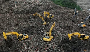 குப்பை நிரப்பும் இடம் சரிந்தது - லாரி ஓட்டுநர்கள் பலி