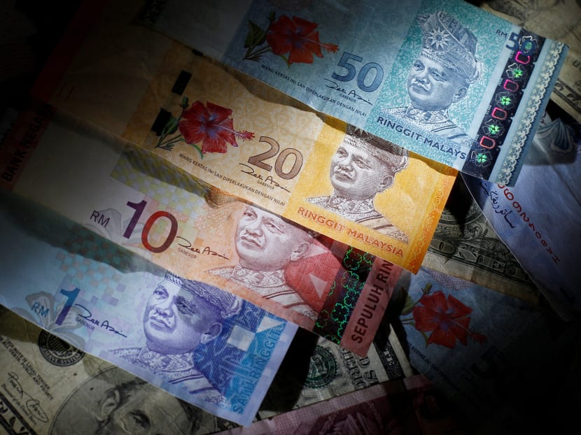 Malaysian ringgit notes are seen among other currency notes in this photo file illustration taken in Singapore March 14, 2013. Photo: Reuters
