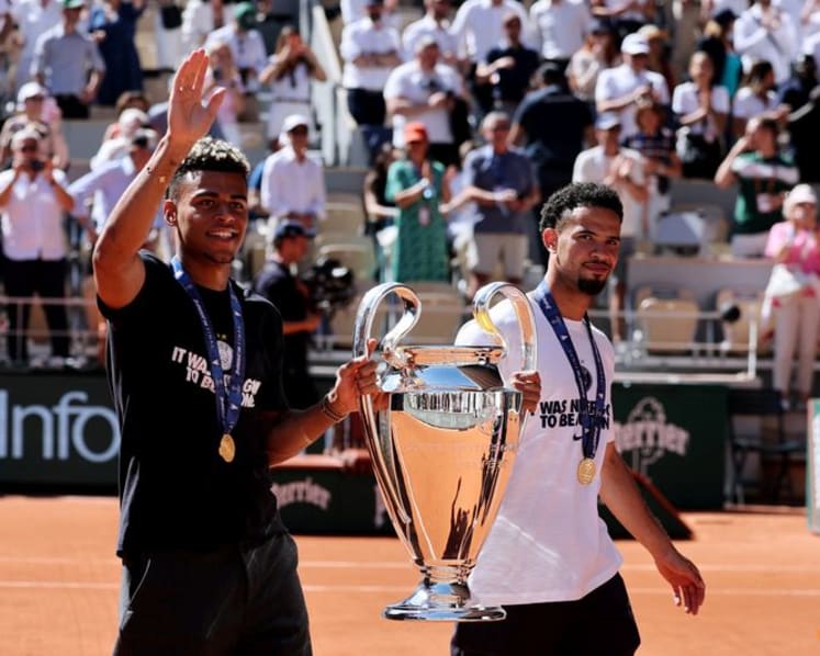 PSG players celebrate Champions League back-to-back titles with French Open crowd