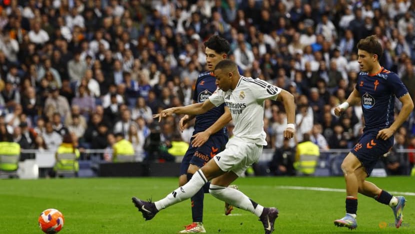 Mbappe double helps Real win 3-2 over Celta Vigo to keep pressure on Barca