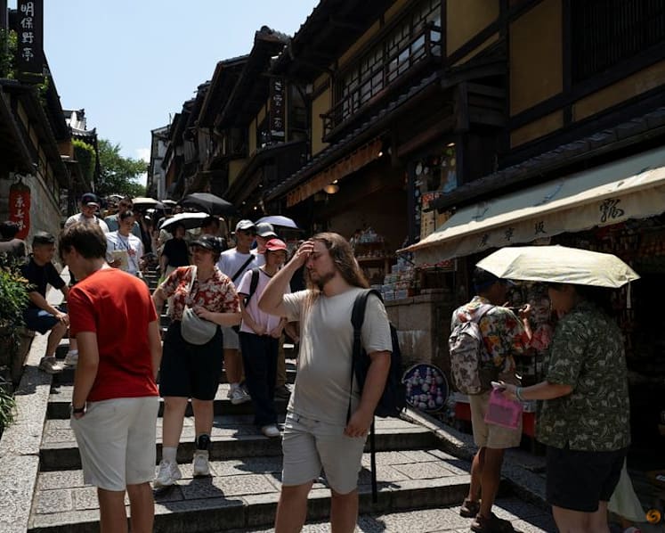 Japan should debate cap for foreign residents, government report says