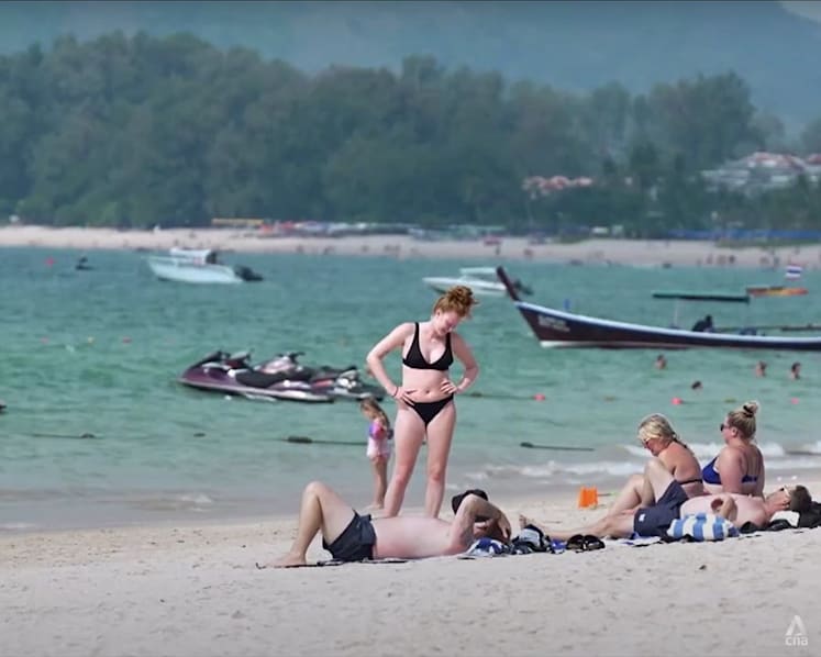 On the Thai island of Phuket, sun, sea and Russians making waves