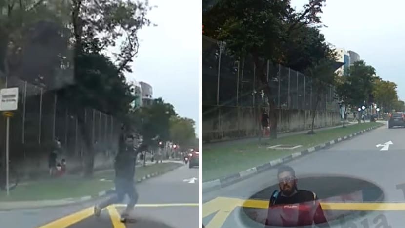 Police probing man seen in viral video running onto car’s path in Serangoon North and falling without being hit